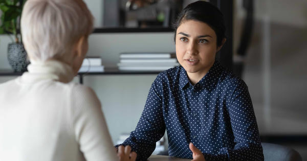 Young Women Talking To Each Other Reduced