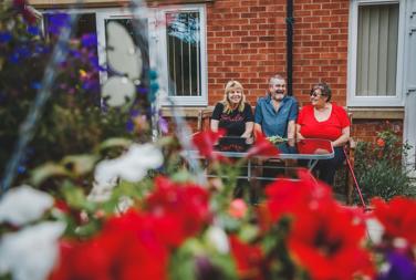 Alhambra Court Customers Jim, Jean And Sharon In Garden