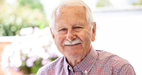 Older Man Smiling At Home
